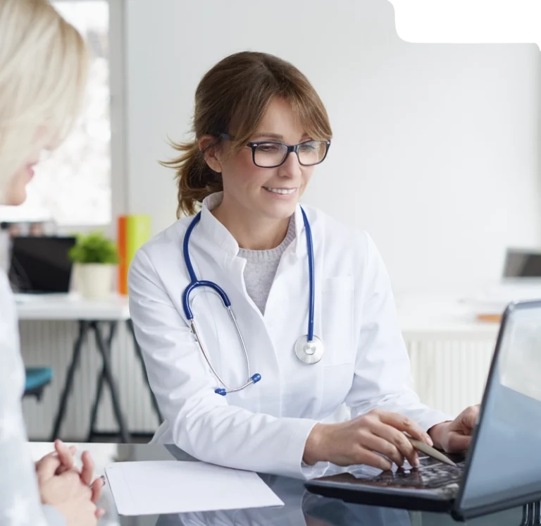 Doctor using Claimity AI-powered medical billing software for faster payments and fewer claim denials.