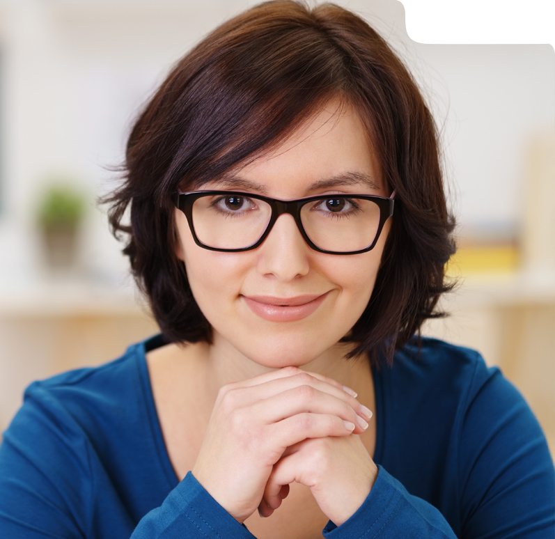 Smiling woman representing AI-enhanced healthcare efficiency.