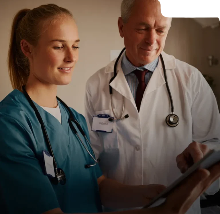 Doctors reviewing patient billing with text about EHR integration, no disruptions, and faster billing.
