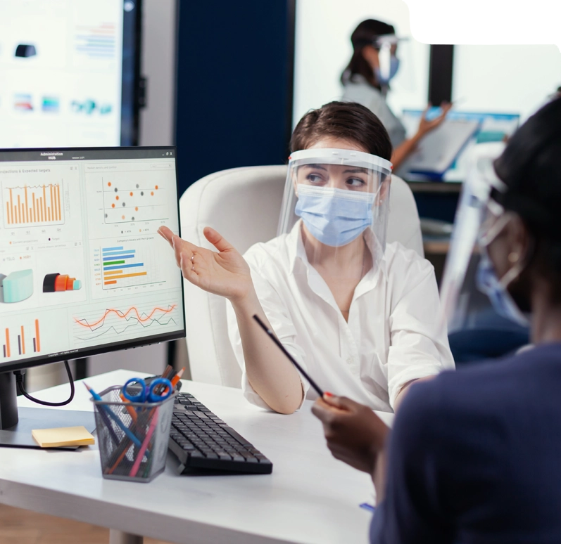 Medical staff reviewing billing dashboard using AI-powered claims software